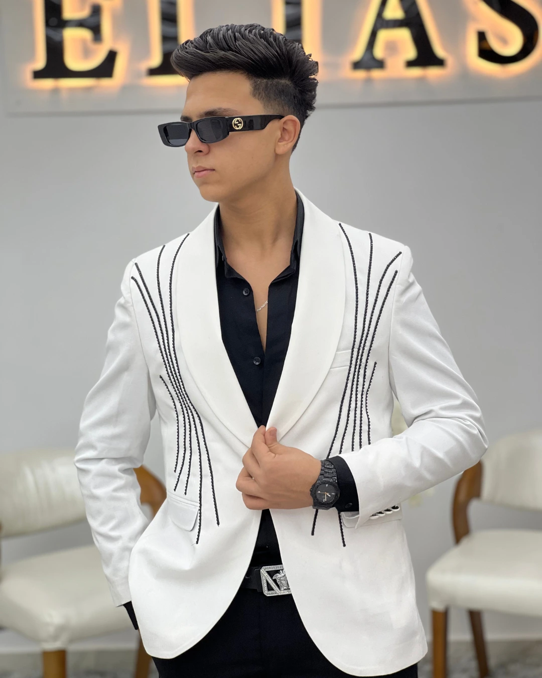 Photo of the younger model in Egypt in a suit